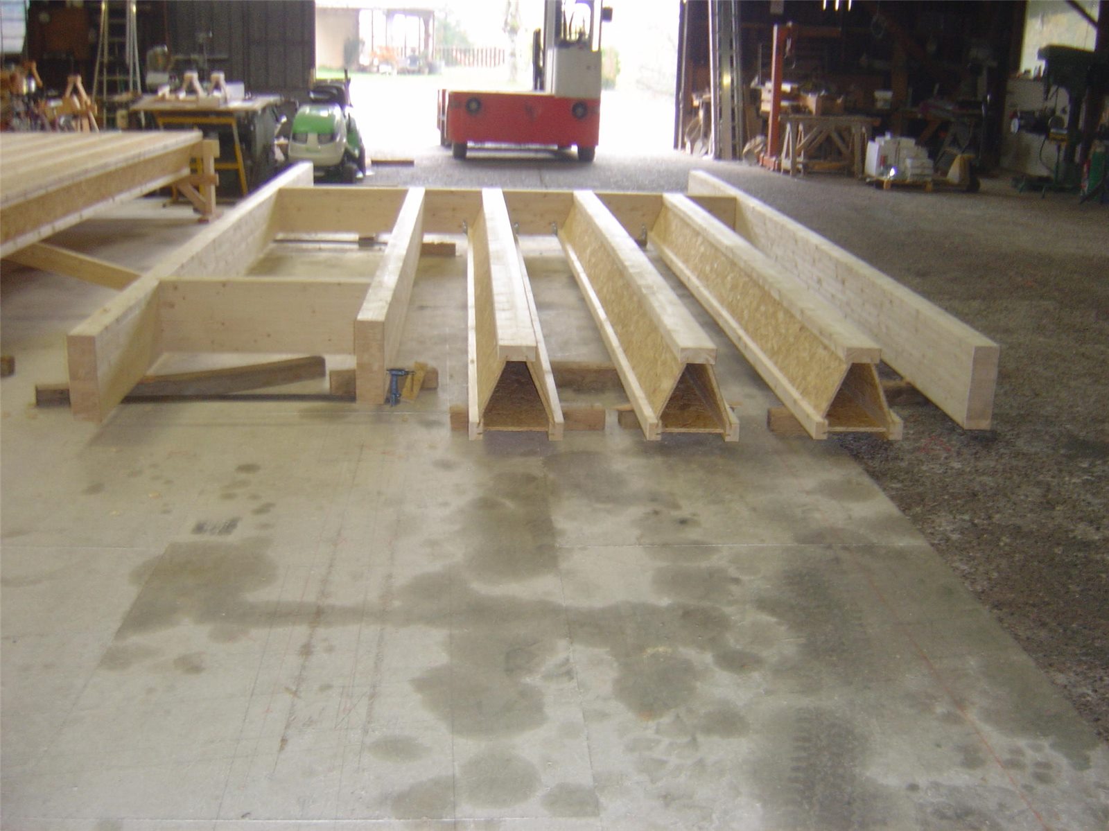 Assemblage de plancher Poutre Jappy — membrures bois et âmes OSB